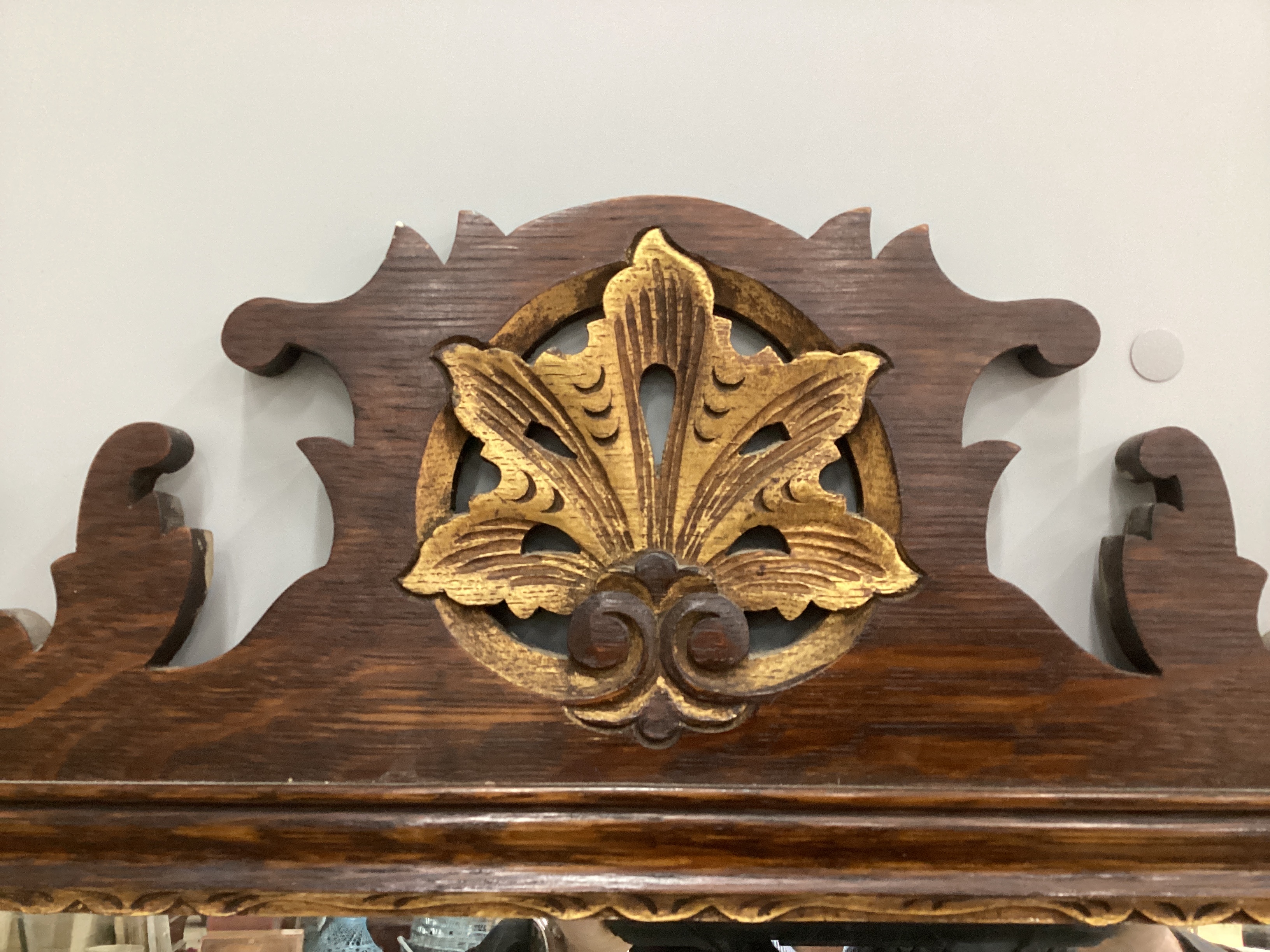 A large George III style parcel gilt oak fret cut pier glass, width 92cm, height 183cm